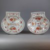 W105 Pair of Chinese rouge-de-fer moulded shell-shaped dishes