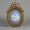 W134 Wedgwood blue jasper oval plaque sprigged in white with 'Aurora'