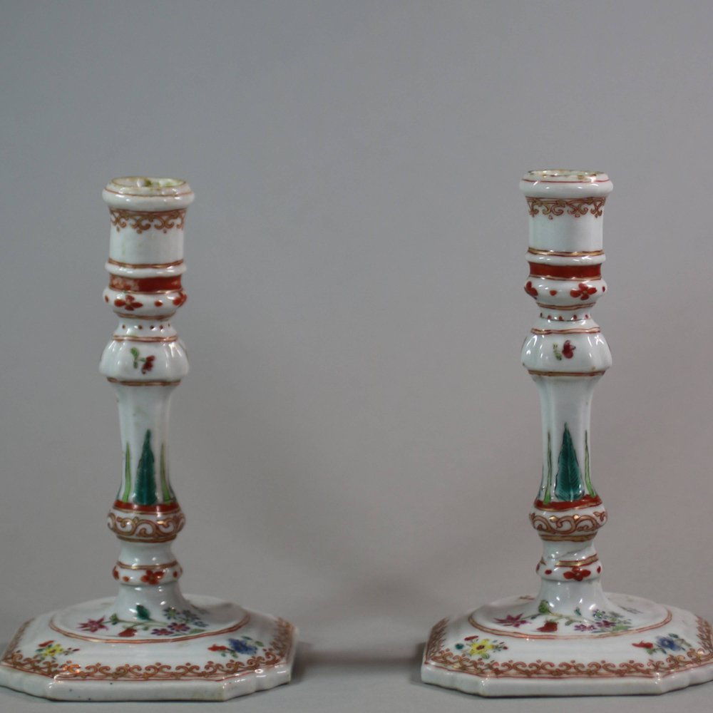 W18 Pair of famille rose candlesticks, late 18th century