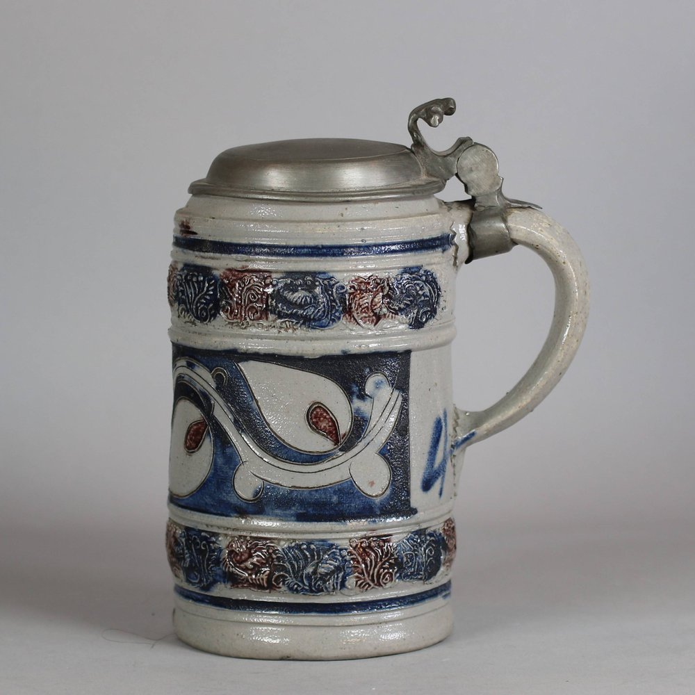 W289 German moulded tankard with pewter lid, 18th century