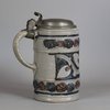 W289 German moulded tankard with pewter lid, 18th century