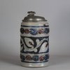 W289 German moulded tankard with pewter lid, 18th century