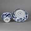 W321 Blue and white moulded teabowl and saucer