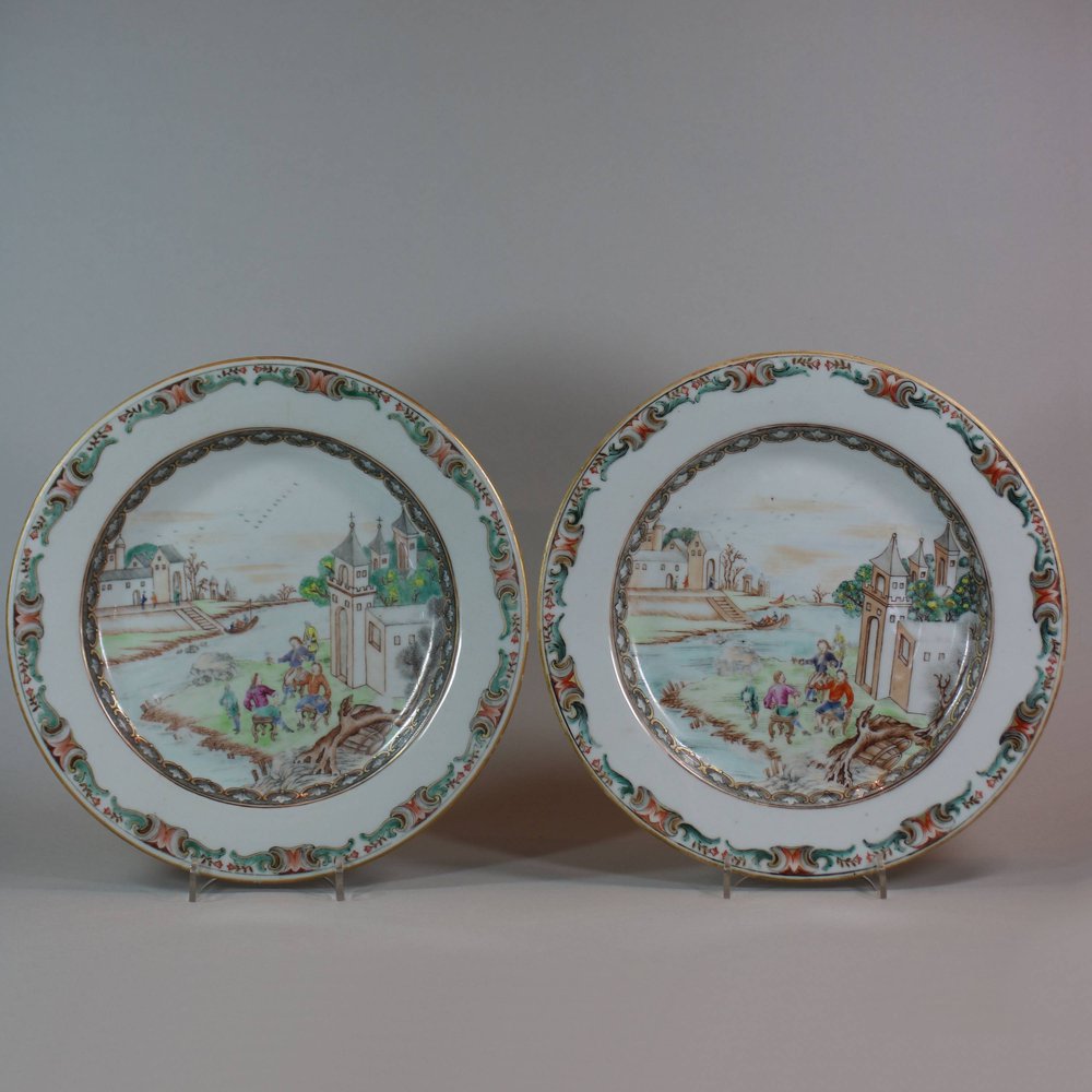 W33 Pair of famille rose European subject plates