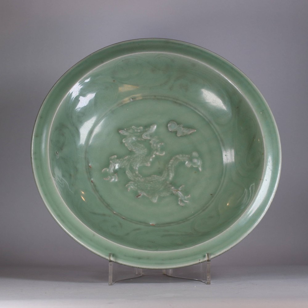 W347 A moulded and carved Longquan celadon 'dragon' dish