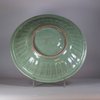 W347 A moulded and carved Longquan celadon 'dragon' dish