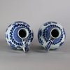 W371 Pair of Japanese blue and white jugs, c.1680