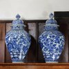 W389 Pair of Japanese blue and white baluster jars and covers