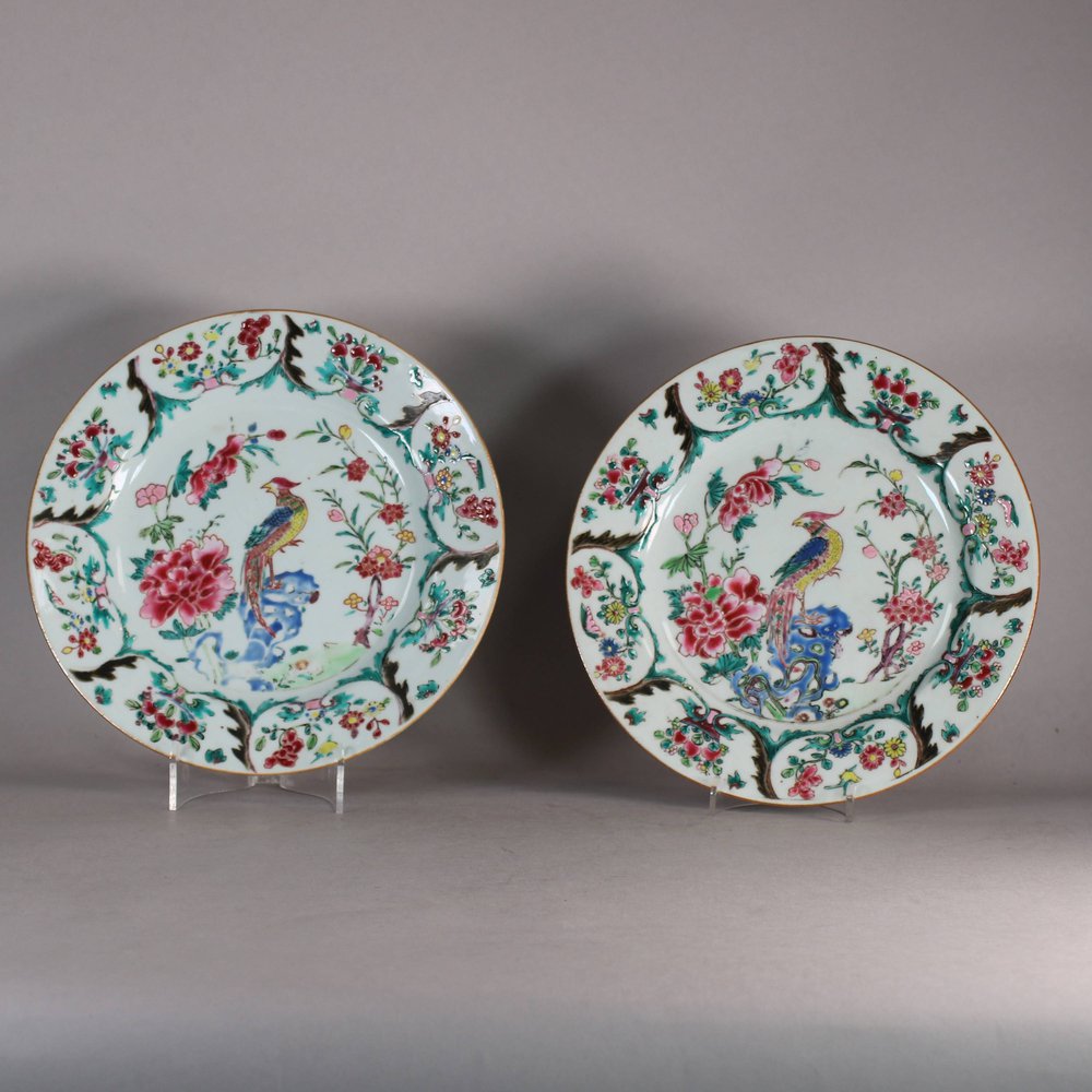 W504 Pair of Chinese famille rose plates, Qianlong (1736-95), decorated with a partridge sitting on a rock between branches of peony and plum blossom, the border with     , diameter: 22.3 cm. (8 15/16 in.)