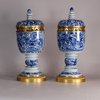 W544 Pair of ormolu mounted chalices with domed covers Kangxi(1662-1722) the cup shaped bowls supported on annulated stems with spreading feet, the covers with ribbed finals, all painted with in a bright u