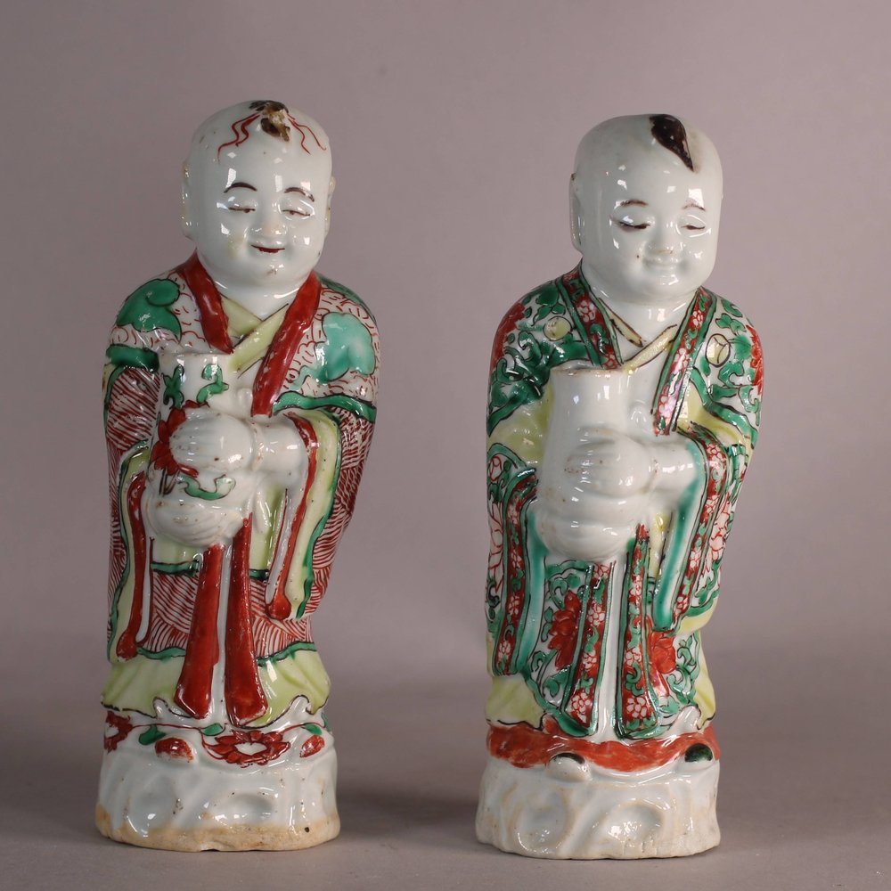 W664 Two exceptional Chinese famille verte figures of boys holding jars, Kangxi (1662-1722)