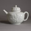 W703 Meissen Böttger white teapot and cover, circa 1715, with short conical spout and loop handle, the globular body decorated with ‘Irmingersche Belege’ applied