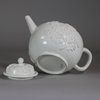 W703 Meissen Böttger white teapot and cover, circa 1715, with short conical spout and loop handle, the globular body decorated with ‘Irmingersche Belege’ applied