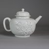 W703 Meissen Böttger white teapot and cover, circa 1715, with short conical spout and loop handle, the globular body decorated with ‘Irmingersche Belege’ applied