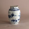 W718 An ovoid shaped Delft earthenware blue and white vase with a Chinoiserie decoration of figures in a landscape.