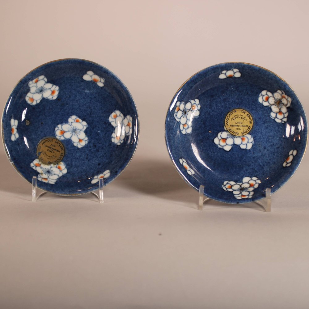 W796 Pair of Chinese powder blue ground saucers