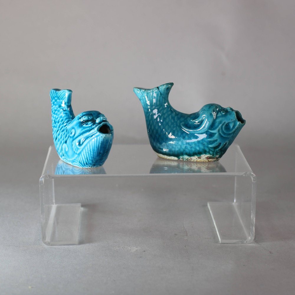 W914 Pair of Chinese turquoise glazed water droppers, Kangxi (1662-1722), moulded in the form of a dragon-fish, with incised details including scale pattern, fangs and beard.