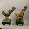 W990 Pair of MIng tile figures in the form of dynamic leaping carp in lead green and yellow glazed