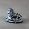 W993 Rare small Dutch delft blue and white figure of a recumbent lion