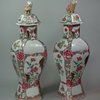 X148 Pair of famille rose octagonal-shaped vases and covers