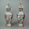 X148 Pair of famille rose octagonal-shaped vases and covers