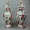 X148 Pair of famille rose octagonal-shaped vases and covers