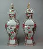 X148 Pair of famille rose octagonal-shaped vases and covers