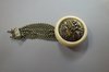 X422 Japanese ivory and gilt metal kagambuta netsuke