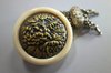 X422 Japanese ivory and gilt metal kagambuta netsuke