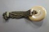 X422 Japanese ivory and gilt metal kagambuta netsuke