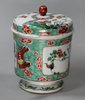 X55 Famille verte twin-handled jar and cover on a spreading foot