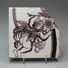 X608 Dutch delft manganese tile decorated with an angel