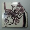 X608 Dutch delft manganese tile decorated with an angel
