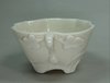 X675 Blanc de chine moulded cup in the form of lotus leaf