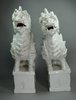 X687 Pair of blanc de chine kylins, 17th century,      SOLD