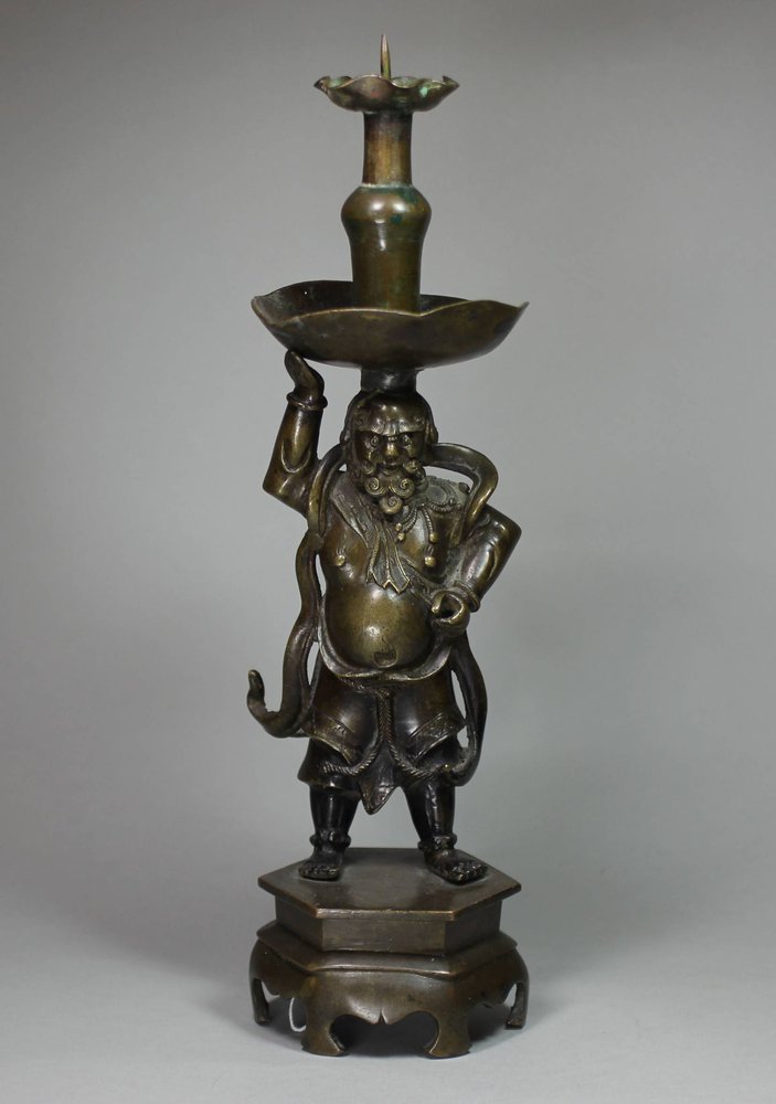 X688 17th century bronze candlestick, height: 11 1/8in.