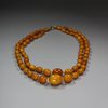 X734 Graduated amber necklace, 54gms gross weight.     SOLD
