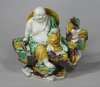 X806 Famille verte egg and spinach figure of Buddha