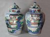 X859 Pair of Chinese wucai baluster vases and covers