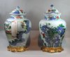 X859 Pair of Chinese wucai baluster vases and covers