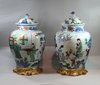 X859 Pair of Chinese wucai baluster vases and covers