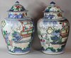 X859 Pair of Chinese wucai baluster vases and covers