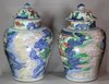 X859 Pair of Chinese wucai baluster vases and covers