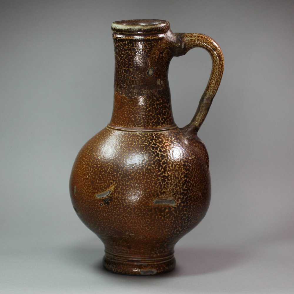 X953 German brown saltglaze stoneware jug, circa 1600