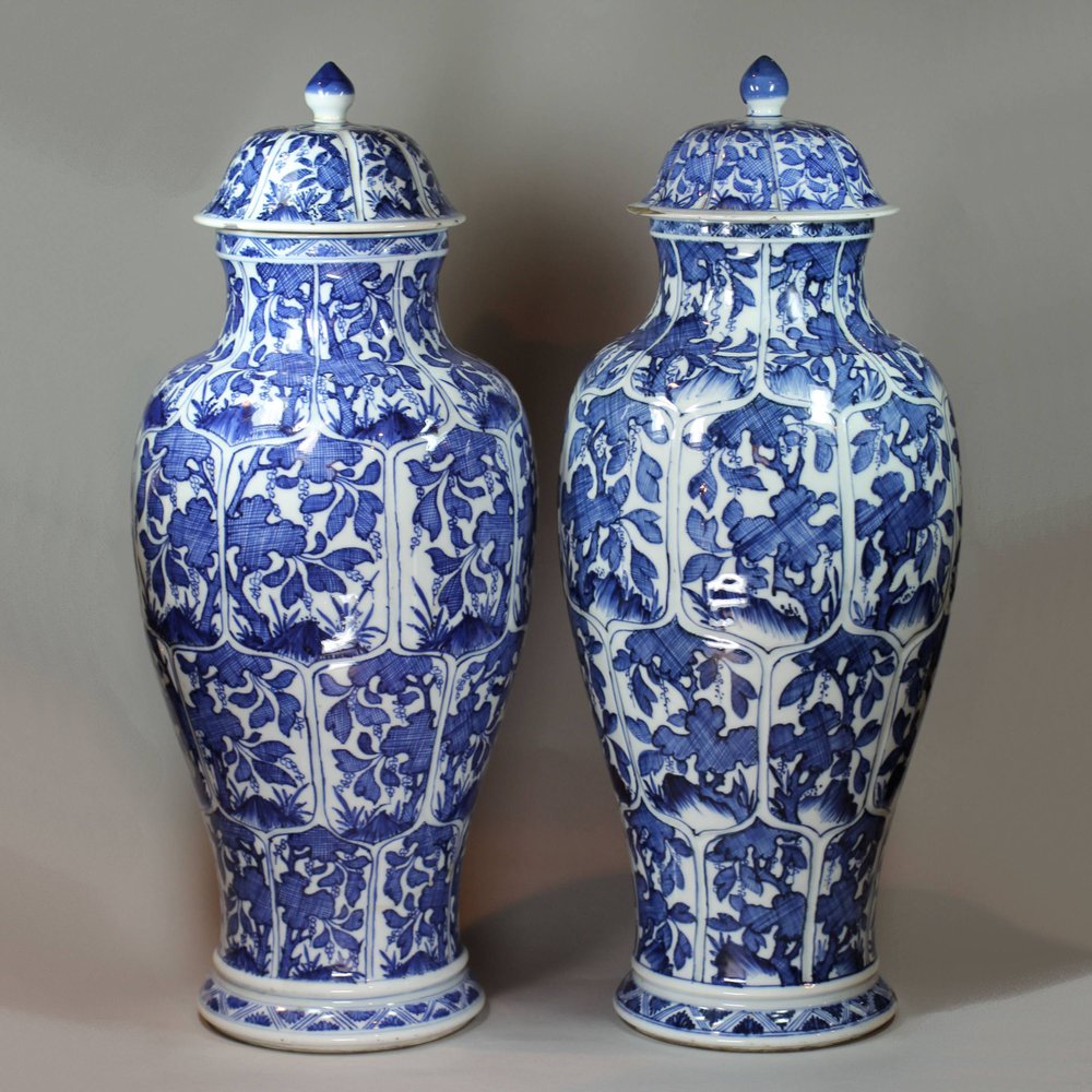 Y140 Pair of Chinese blue and white baluster vases and covers