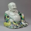 Y258 Famille verte biscuit figure of the laughing Budai/Hotei