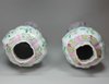 Y399 Pair of famille rose moulded vases and covers