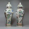 Y66 A matched pair of Chinese hexagonal baluster vases and covers