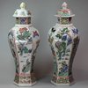 Y66 A matched pair of Chinese hexagonal baluster vases and covers