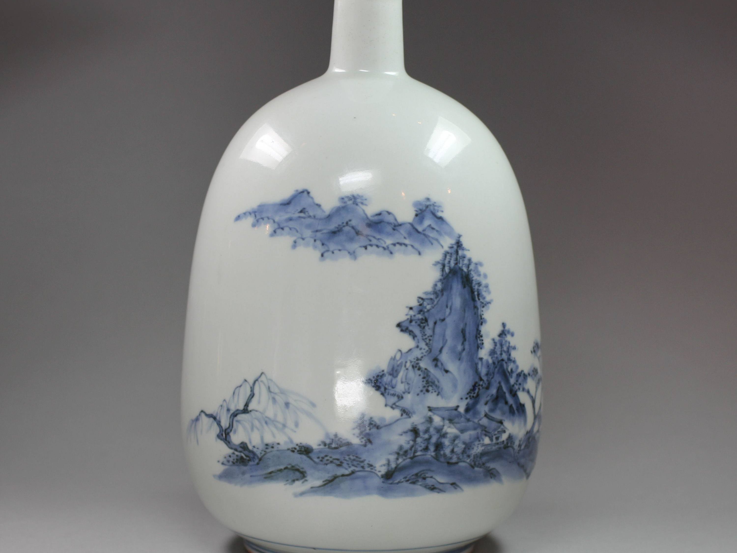 An extremely rare blue and white 'lotus' conjoined vase